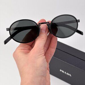 Prada PRB56S Oval Sunglasses – Black Frame with Dark Grey Lenses | Model AAV08Z